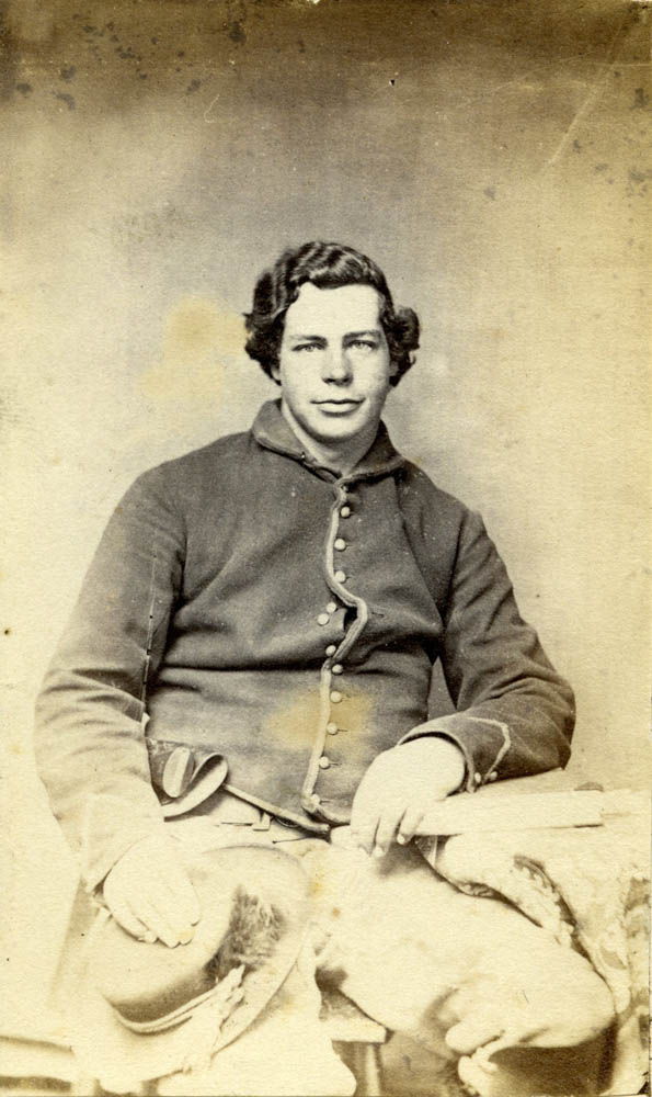 Photograph of Charles Bates Jr. sitting.
