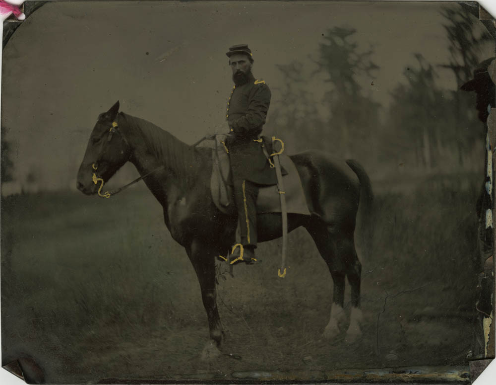 Photograph of Zimri Bates on horseback.