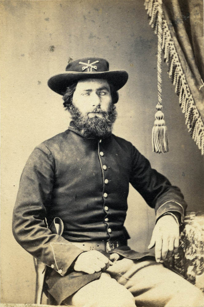 George Cook sitting in uniform.