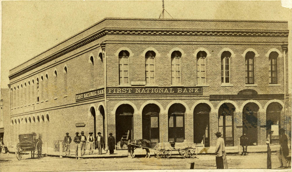 People gathered around First National Bank in St. Louis, Missouri.