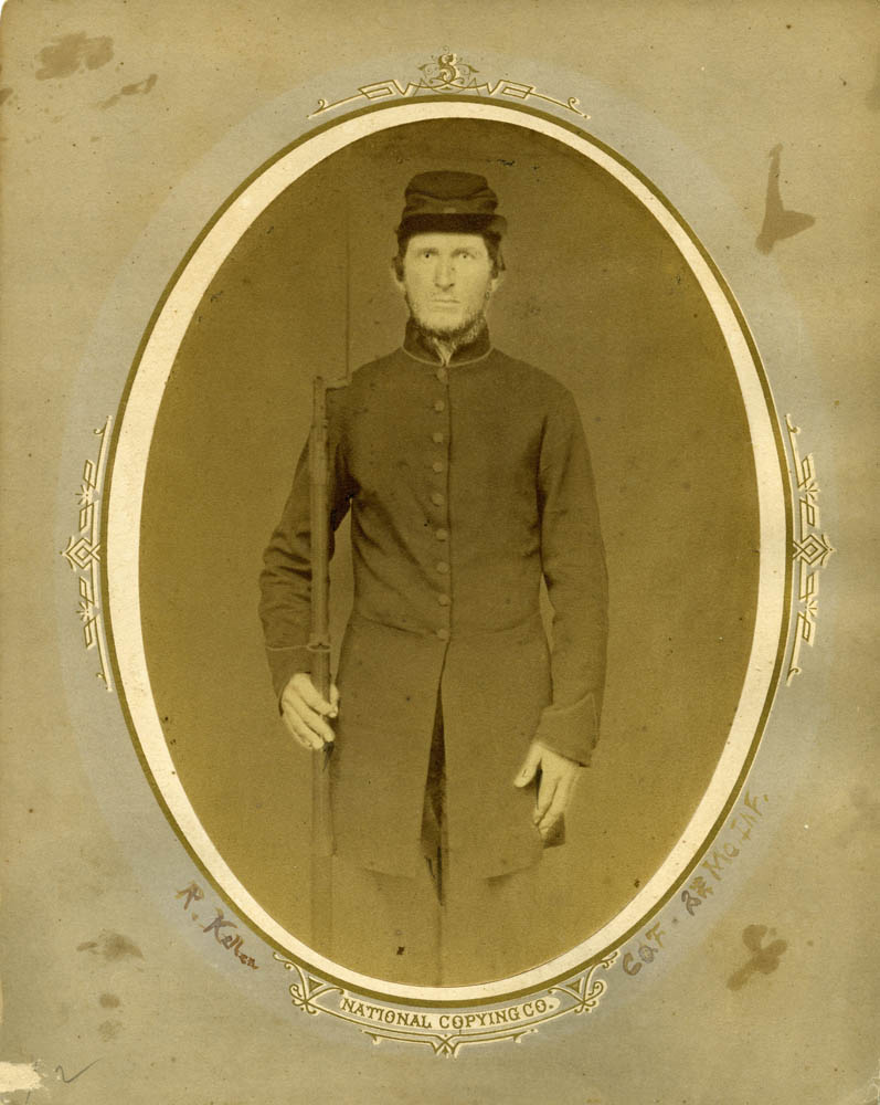 Rolla Keller standing in uniform.