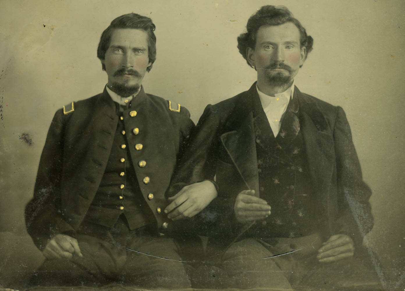 Ambrotype of James S. Rogers and another solider seated side by side each other.