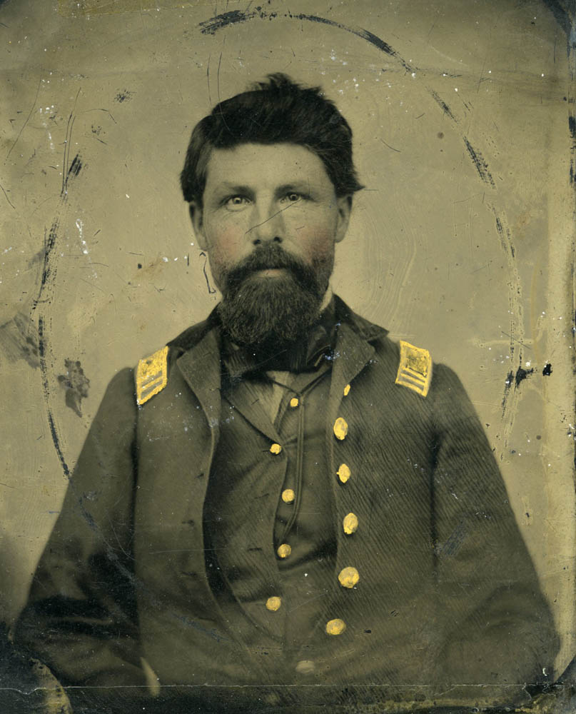 Tintype of Theodore A. Switzler seated in uniform.