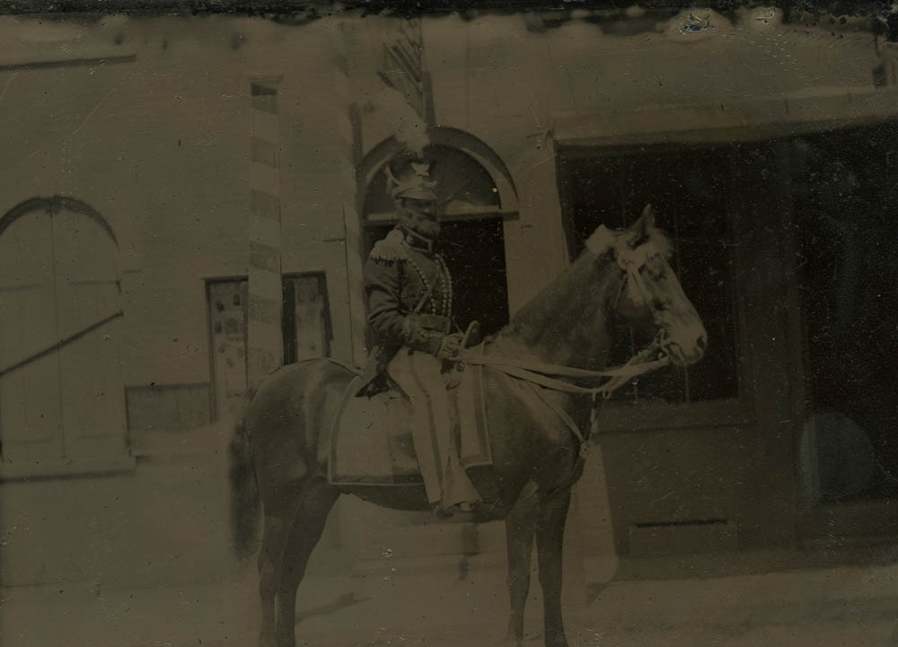 Tintype of a mounted Dragoon in uniform.