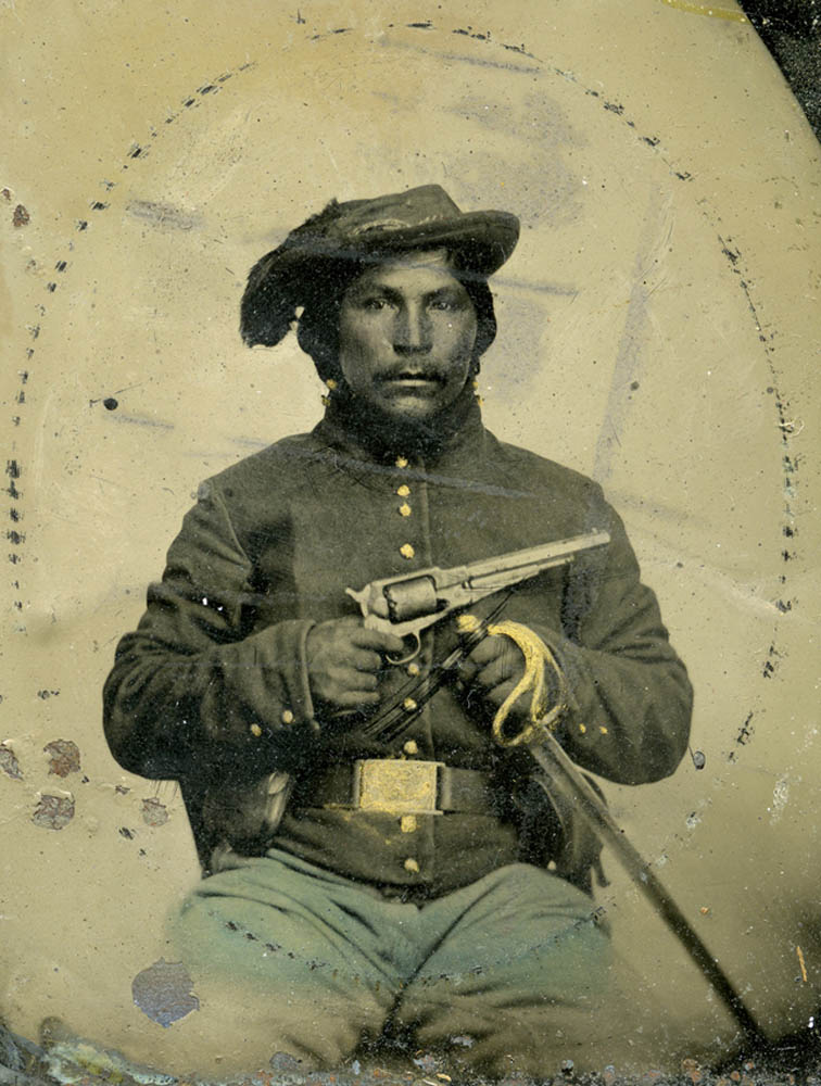 Unidentified federal American Indian in uniform with revolver and sword.