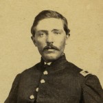 William Inman sitting in uniform.